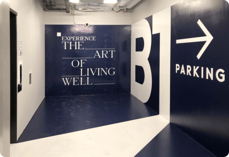 B1 parking lettering and a right-pointing arrow on a garage wall.