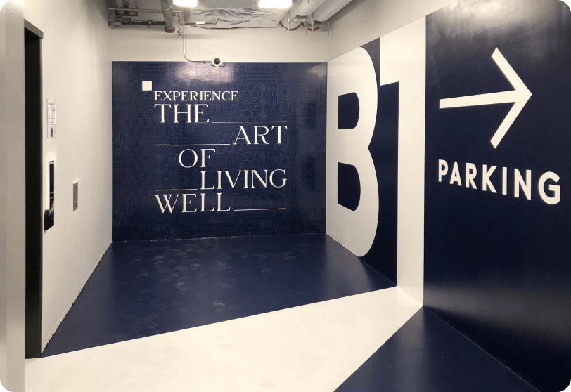 B1 parking lettering and a right-pointing arrow on a garage wall.