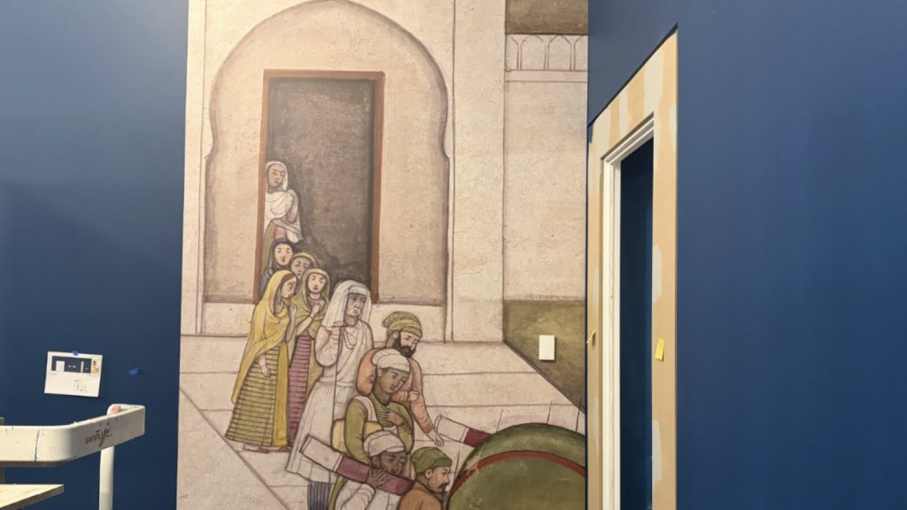 Printed illustrated exhibition panels in a Smithsonian museum gallery.