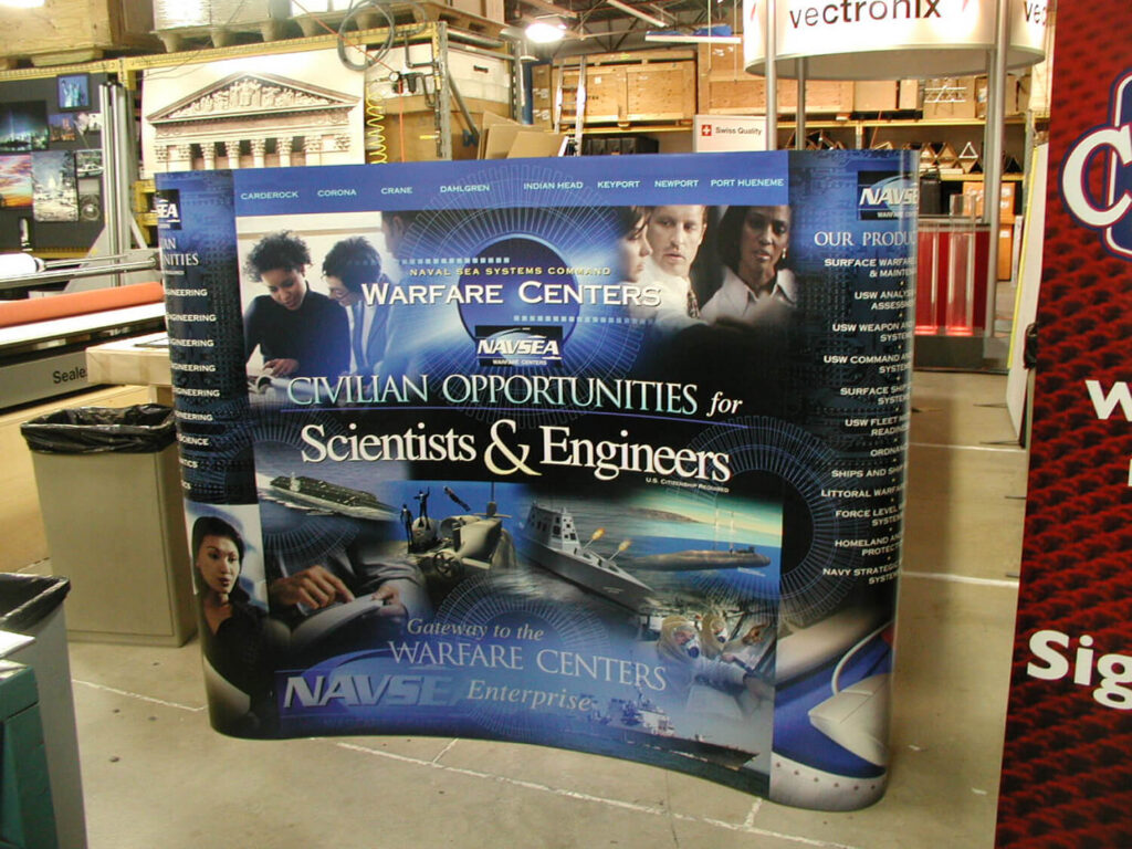 Naval Surface Warfare Center recruitment display for scientists and engineers.