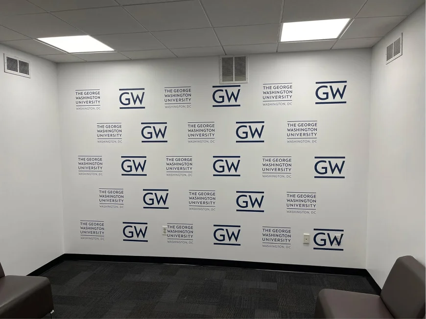George Washington University logos repeated across a branded backdrop.